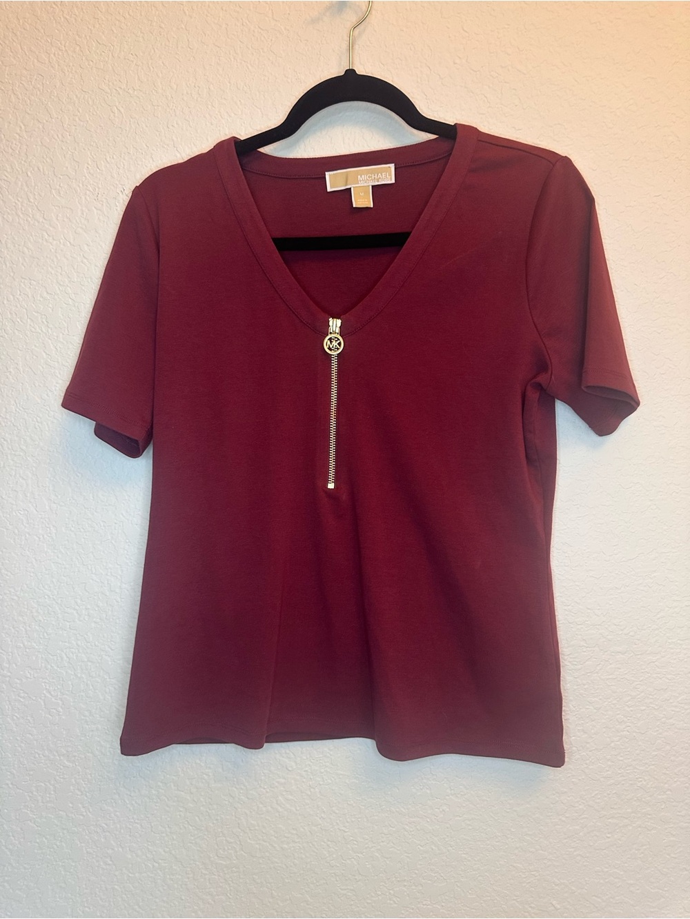 Michael Kors Wine V‑Neck Short Sleeve Top with Gold Zip
